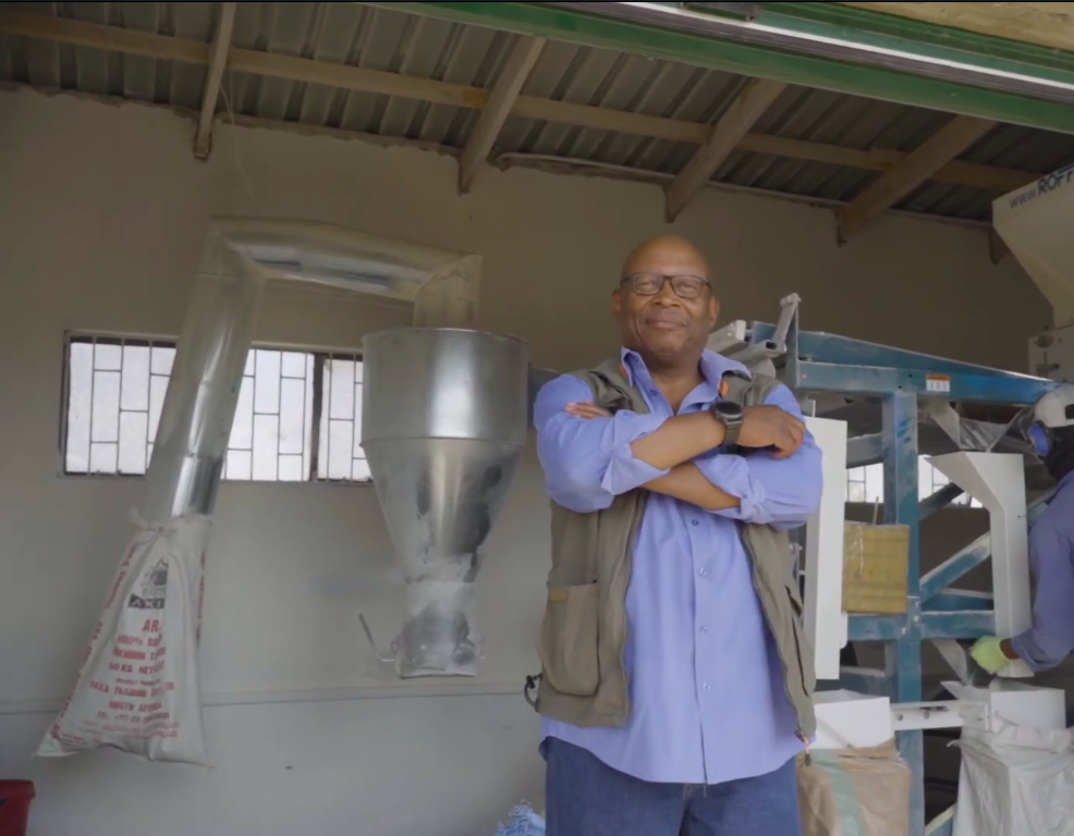 Man next to milling machine